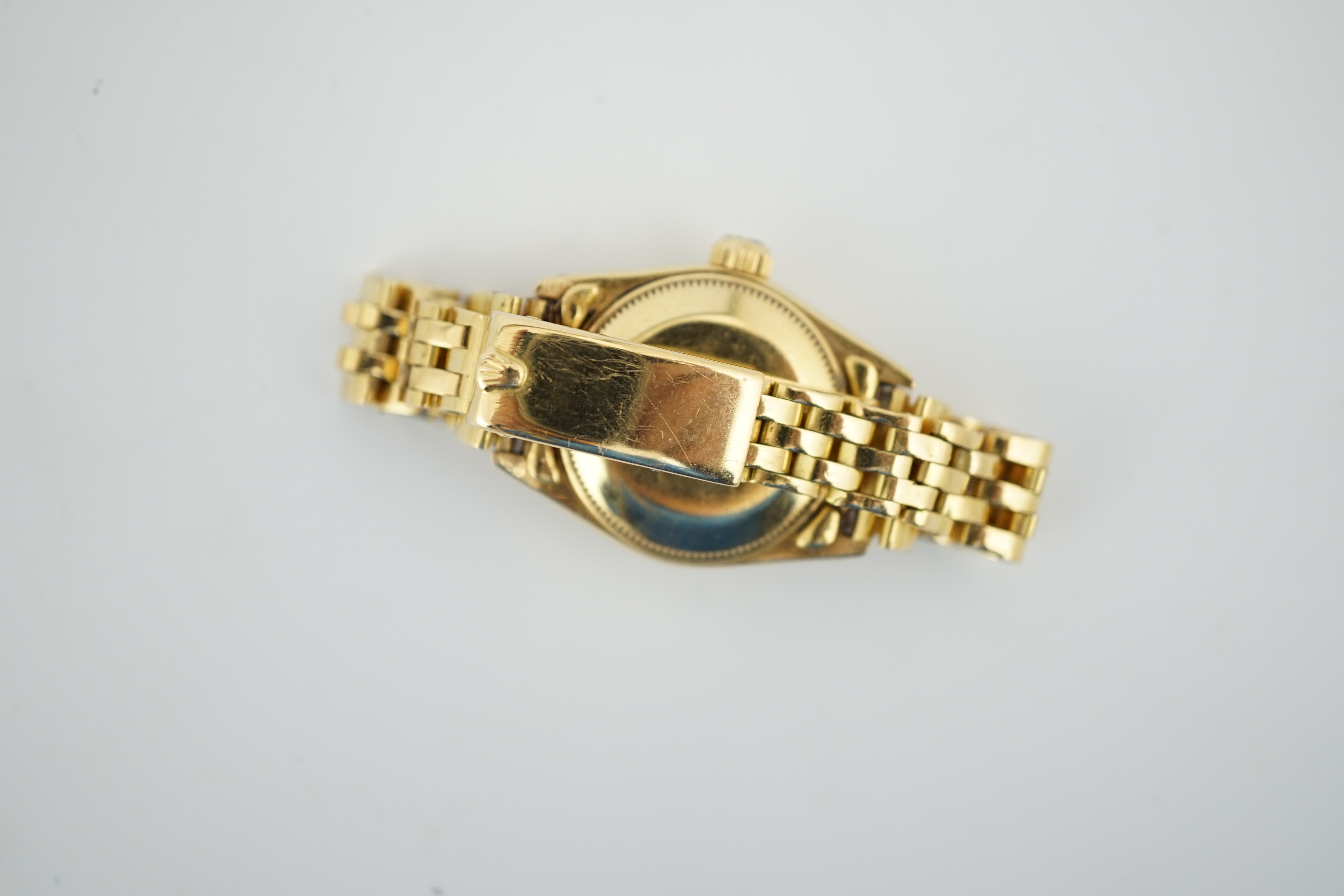 A lady's 1970's 18ct gold Rolex Oyster Perpetual Datejust wrist watch, on an 18ct gold Rolex bracelet